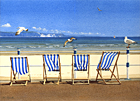A painting of deck chairs on the prom at Weymouth with seagulls by Margaret Heath.